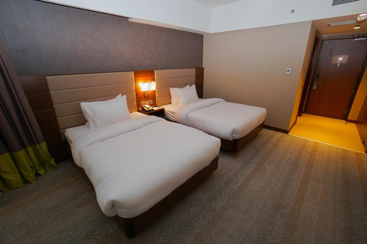 The Grand Lux Hotel Doha Exterior foto Deluxe room