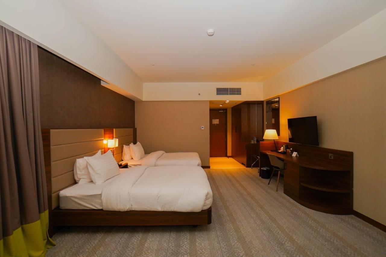 The Grand Lux Hotel Doha Exterior foto Deluxe room